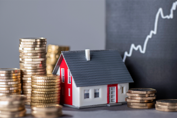 A House with coins, showing rising rates